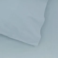 Essential Percale Sheet Set - Sky -ferm LIVING Store SKY PILLOWCASE DETAIL 1e8cef24 a396 41b5 aa92 78d1bd1b6430