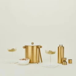 Simple Barware, 4 Piece Set -ferm LIVING Store simple brass barware set HNY.500.40.024.BRS styled